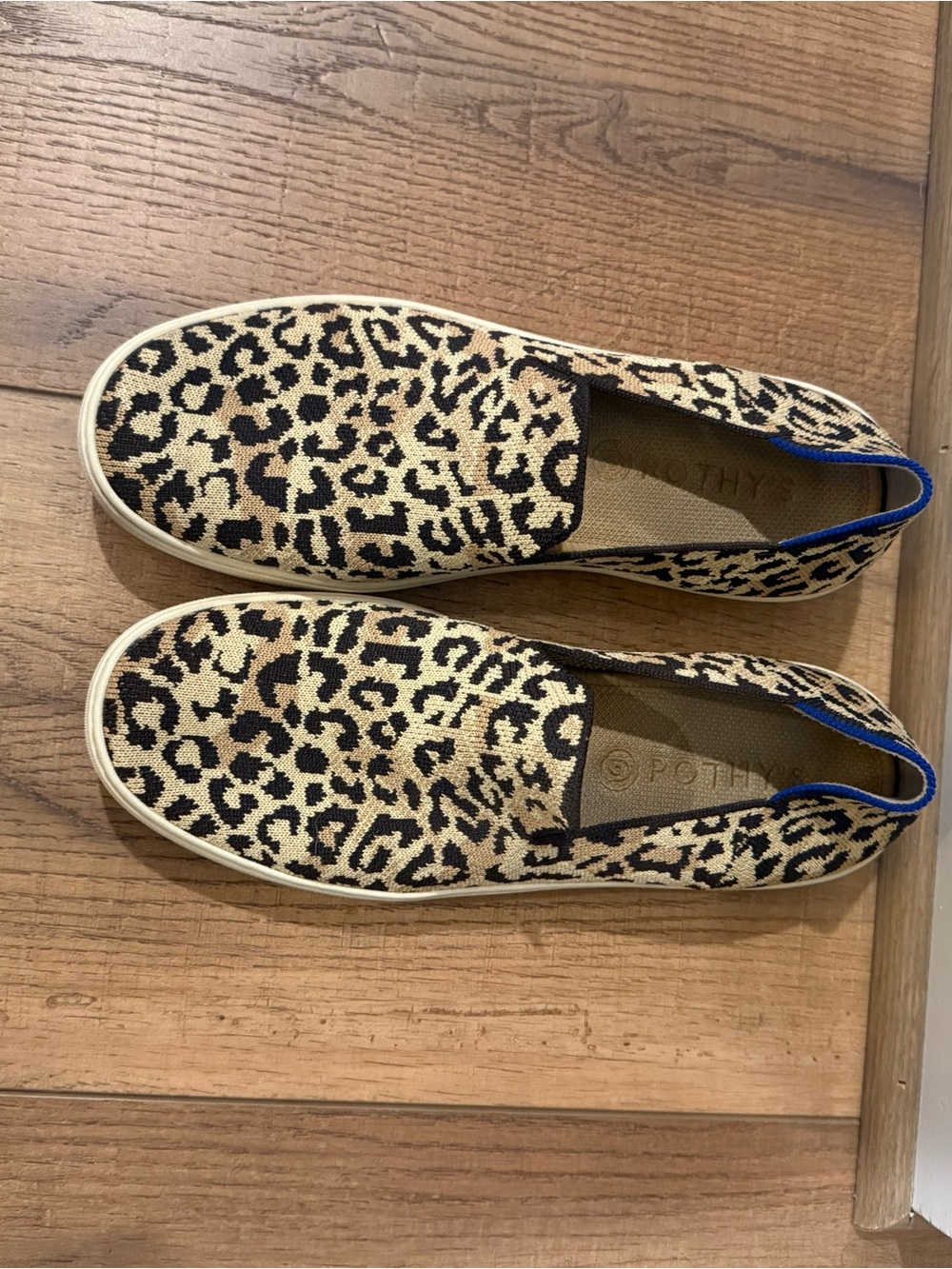 Rothy’s Leopard Print Slip-On Sneakers with Blue Trim